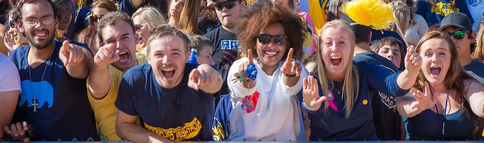 Students celebrating at a UNC Football game!